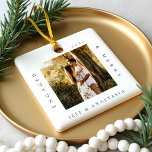 Minimal Modern Engaged & Merry 2 Photo Engagement Ceramic Ornament<br><div class="desc">Minimal and modern simple photo keepsake photo ornament to commemorate your first Christmas engaged. The design features a simple minimal design with a square photo design to display your special engagement photo. "Engaged & Merry", year and couple's name displayed in a simple modern design around the photo. Two photo ornament...</div>