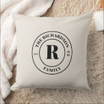 Minimal Neutral Pastel Family Monogram Stamp  Cushion<br><div class="desc">Add a touch of elegance and personalisation to your home décor with this custom throw pillow "Minimal Neutral Pastel Family Monogram Stamp Throw Pillow", featuring a black stamp design with a customisable family name, family name monogram, and a year on a neutral pastel colour background. Whether as a housewarming gift,...</div>