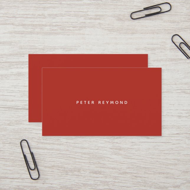 minimal of the minimalist brick-red business card (Front/Back In Situ)