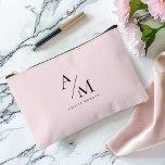 Minimal Pastel Pink Initial & Personalised  Accessory Pouch<br><div class="desc">Travel in style with this Minimal Pastel Pink Initial & Personalised Duffle Bag. Featuring a sleek and minimalist design, this duffle bag is perfect for weekend getaways, gym sessions, or daily commutes. The soft pastel pink background adds a touch of elegance and femininity, while the personalised initial or name makes...</div>