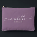 Minimal Wisteria Purple Personalised Bridesmaid Accessory Pouch<br><div class="desc">Introducing our Chic Minimalist Wisteria Purple Personalised Bridesmaid Accessory Pouch, a stylish and versatile gift designed to celebrate your bridesmaids in elegance. This accessory pouch is the epitome of modern chic, perfect for any occasion from bridesmaid proposals to bridal showers. Crafted with a minimalist design, this pouch features a Wisteria...</div>