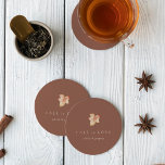 Minimalist Autumn Leaf "Fall in Love" Personalised Round Paper Coaster<br><div class="desc">Fall in love with this modern and minimal design for autumn weddings, engagement parties, or rehearsal dinners. Clean, minimalist design features a terracotta rust background graced with a single watercolor leaf in warm fall colours. "Fall in love" appears beneath, along with the couple's names or your choice of personalisation in...</div>
