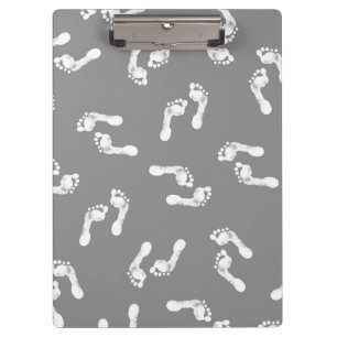 Minimalist Baby Feet on a Clipboard