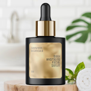 minimalist beauty product label black on gold