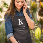 Minimalist Black and White Modern Monogram Apron<br><div class="desc">A minimalist vertical design in an elegant style in monochrome black and white and large typographic initial monogram. The text can easily be customised for a design as unique as you are!</div>