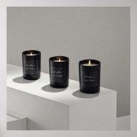 Minimalist black-line candles with tiny flames