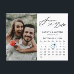 Minimalist Black Modern Script Photo Save the Date Announcement Postcard<br><div class="desc">Minimalist Black Modern Script ‘Save the Date’ Announcement Postcard featuring Custom Calendar with a beautiful Photo. Let your family, friends and colleagues know that you have set a date for your wedding celebration with this elegant card. To move the Ring marker > click blue ‘Personalise’ > click blue ‘Edit Using...</div>