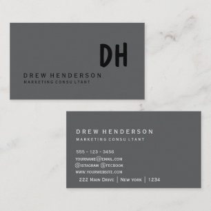 Minimalist Black Monogram Business Card on the
