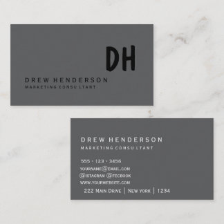 Minimalist Black Monogram Business Card on the