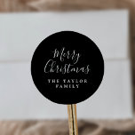 Minimalist Dark Black Merry Christmas Holiday Gift Classic Round Sticker<br><div class="desc">These minimalist dark black Merry Christmas holiday gift stickers are perfect for a simple holiday present or holiday card. The design features classic black and white typography paired with a rustic yet elegant script font with hand lettered style. Personalise the stickers with your name.</div>