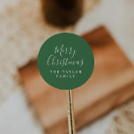 Minimalist Dark Green Merry Christmas Holiday Gift Classic Round Sticker<br><div class="desc">These minimalist dark green Merry Christmas holiday gift stickers are perfect for a simple holiday present or holiday card. The design features classic green and white typography paired with a rustic yet elegant script font with hand lettered style. Personalise the stickers with your name.</div>