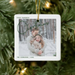 Minimalist First Married Christmas Script Photo Ceramic Ornament<br><div class="desc">Remember your first married Christmas forever with this modern,  minimalist holiday ornament,  featuring 'Christmas' in a rich,  traditional Christmas green hand lettered typography and your favourite wedding photo. The photo is repeated on the back,  with your wedding date details overlaid. Copyright Anastasia Surridge,  all rights reserved.</div>