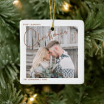 Minimalist First Married Christmas Script Photo Ceramic Ornament<br><div class="desc">Remember your first married Christmas forever with this modern,  minimalist holiday ornament,  featuring 'Christmas' in trendy,  modern salted caramel hand lettered typography and your favourite wedding photo. The photo is repeated on the back,  with your wedding date details overlaid. Copyright Anastasia Surridge,  all rights reserved.</div>