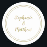 Minimalist Gold White Wedding Bride & Groom Favour Classic Round Sticker<br><div class="desc">Simple, minimalist and chic Wedding design features bride & groom's names in a modern design with a double framed border in classic gold colour on a chic crisp white background. The modern design is simple and chic. Personalise wedding details with your names in sophisticated script. Be sure to see the...</div>