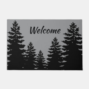 Minimalist grey and black pine tree silhouette a doormat