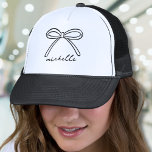 Minimalist Hand Drawn Bow Name Trucker Hat<br><div class="desc">Simple Name Monogram Minimalist Trucker Hat. This trendy and stylish trucker hat features a single hand-drawn bow at the top, paired with a name in elegant handwritten script calligraphy below. Both the bow and the name are currently black but can be customised to any colour, making it a versatile accessory...</div>