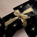 Minimalist modern gold stars black Christmas gift Wrapping Paper<br><div class="desc">Elegant simple faux gold sparkling stars pattern Christmas holiday black gift wrapping paper.</div>