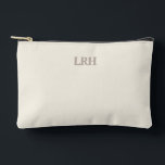 Minimalist Monogram Bridesmaid Makeup Pouch<br><div class="desc">The perfect little pouch for wedding-day touch-ups and beyond. Featuring an ivory background and grey monogram,  this bridesmaid gift is stylish,  functional,  and a lasting reminder of your special day together.</div>