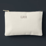 Minimalist Monogram Bridesmaid Makeup Pouch<br><div class="desc">The perfect little pouch for wedding-day touch-ups and beyond. Featuring an ivory background and grey monogram,  this bridesmaid gift is stylish,  functional,  and a lasting reminder of your special day together.</div>