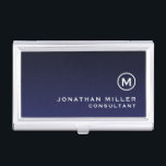 Minimalist Monogram Navy Blue Business Card Holder<br><div class="desc">Elevate your networking game with this minimalist business card case featuring a monogram medallion, name and title or custom text of your choice. The sleek and sophisticated design makes a statement of elegance and professionalism. The case is perfect for holding your business cards, credit cards, or IDs. It's compact and...</div>