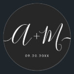 Minimalist Monogram Script Custom Wedding date Classic Round Sticker<br><div class="desc">Elevate your wedding details with the Minimalist Monogram Script Custom Wedding Date Sticker white text on black. This elegant and personalised sticker adds a touch of sophistication to your wedding stationery, allowing you to showcase your monogram and wedding date in a simple yet impactful way. The sticker features a minimalist...</div>