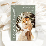 Minimalist Newlyweds Photo Merry & Married  Holiday Card<br><div class="desc">Celebrate your love this holiday season with a beautifully designed card featuring your favourite photo as newlyweds. The minimalist design in sage green provides an elegant backdrop, complemented by simple yet stylish typography that conveys your festive message of "Merry & Married." This modern aesthetic focuses on your cherished moment, creating...</div>