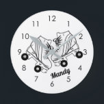 Minimalist Roller Skates Drawing Custom Name Round Clock<br><div class="desc">Minimalist Black And White Roller Skates Drawing. Two quads roller skate illustration in black and white. Simple aesthetic roller skating,  roller skates black and white modern illustration.</div>