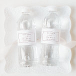 Minimalist Rose Gold Wedding Water Bottle Label<br><div class="desc">These minimalist rose gold wedding water bottle labels are perfect for a simple wedding. The modern romantic design features classic rose gold and white typography paired with a rustic yet elegant calligraphy with vintage hand lettered style. Customisable in any colour. Keep the design simple and elegant, as is, or personalise...</div>