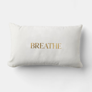Minimalist typography with gold word breathe lumbar cushion