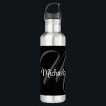 Minimalistic modern monogram initial name 710 ml water bottle<br><div class="desc">Minimalistic modern monogram initial name black white. Personalizable custom name with a cursive initial behind on a black colour.</div>