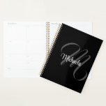 Minimalistic modern monogram initial name planner<br><div class="desc">Minimalistic modern monogram initial name black white. Personalizable custom name with a cursive initial behind on a black color.</div>