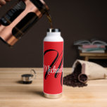 Minimalistic modern monogram initial name red water bottle<br><div class="desc">Minimalistic modern monogram initial name black white. Personalizable custom name with a cursive initial behind on a red colour.</div>