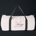 Minimalistic Monogram Initial & Name Pastel Pink Duffle Bag<br><div class="desc">Travel in style with our Minimalistic Monogram Initial & Name Pastel Pink Duffle Bag. This elegant duffle bag features a sleek design personalised with your initial and name, set against a soft pastel pink background. Perfect for gym sessions, weekend getaways, or everyday use, it combines functionality with chic style. Made...</div>