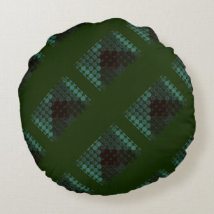 Mint button or pit on forest green, forming shapes round cushion