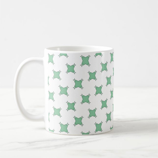 Mint green geometric star motif coffee mug (Left)
