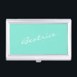 Mint Green Personalised Script Name Design Minimal Business Card Holder<br><div class="desc">This sleek business card case features a fresh mint green background with a custom name in elegant white script lettering. Ideal for professionals who want to add a stylish and personal touch to their daily essentials. This case is perfect for carrying and presenting your business cards at meetings, events, or...</div>