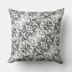 Mirroring of twisted shapes in grey and white cushion