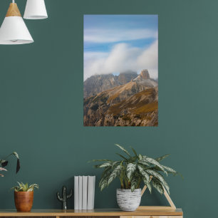 Misty clouds over the autumn orange dolomites poster