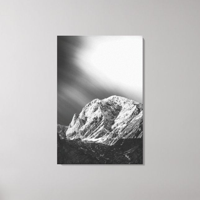 Misty clouds over the mountains in black and white canvas print (Front)