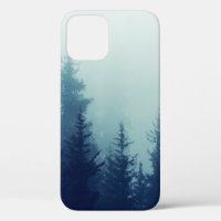 Misty fog in pine forest on mountain slopes. Colou