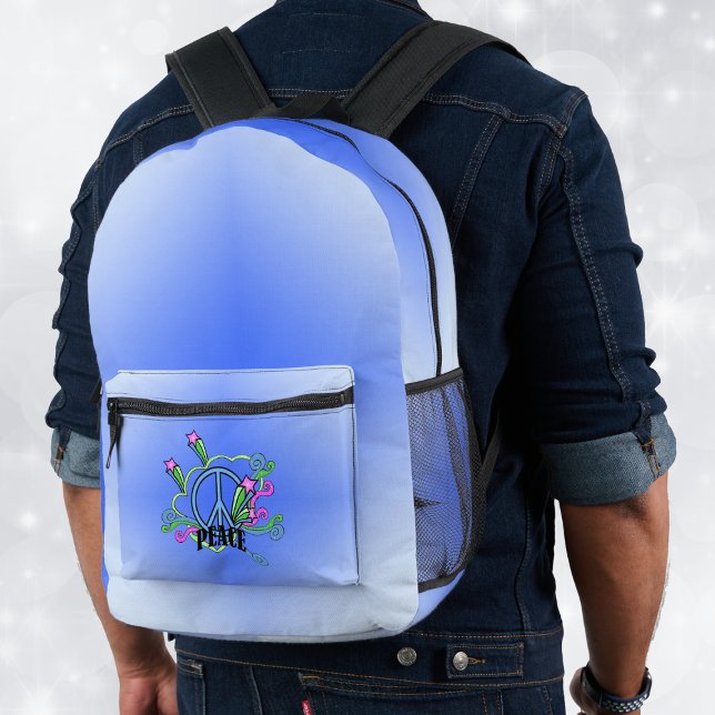 Mix of Shades of Blue Peace Sign Scrolls Stars Printed Backpack (Back pack in mixed shades of blue with abstract colourful peace design on front pocket.)