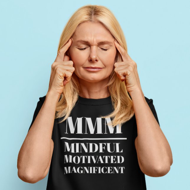 MMM- Mindful, Motivated, Magnificent T-Shirt (Middle aged Caucasian woman wears a t-shirt that reads "MMM: Mindful, Motivated, Magnificent")
