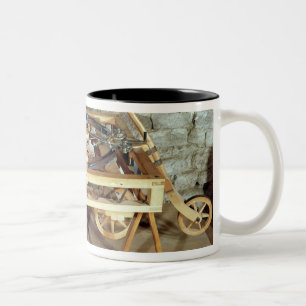 Model of a car driven by springs Two-Tone coffee mug