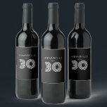 Modern 30th birthday black wine label<br><div class="desc">Stylish,  simple and modern 30th birthday wine label perfect for birthday parties and celebrations.  Personalise with your own name.  Other colours available.  Please contact me for further help with customisation.</div>