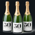 Modern 50 and Fabulous Bold 50th Birthday Party Sparkling Wine Label<br><div class="desc">Modern Minimal Fifty and Fabulous black 50th birthday sparkling wine bottle label that you can personalize for your fiftieth birthday party celebration. The words "50 and Fabulous" are set using trending bold font typography. Text colors can be changed using the edit menu.</div>