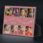 Modern 8 Photo Grid Love You Grandma Pink Plaque<br><div class="desc">Modern and minimal keepsake photo plaque to gift it to a grandmother featuring 8 photos with a curvy typography text that says "we love you grandma." The color is pink.</div>