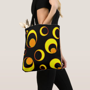 Modern abstract design, yellow circles on black tote bag
