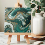Modern Abstract Emerald Green and Gold Marble Tile<br><div class="desc">Introducing our stunning ceramic tile, a captivating piece of art that effortlessly combines elegance and modern design. This tile features a mesmerising abstract pattern reminiscent of swirling ocean waves, with rich emerald green hues blending seamlessly with creamy whites and shimmering gold accents. The intricate marbling effect creates a sense of...</div>