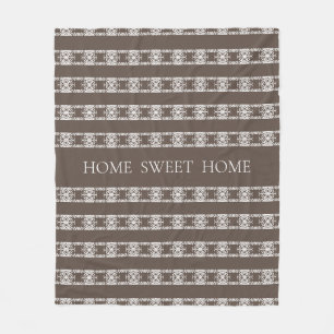Modern abstract floral pattern on brown fleece blanket