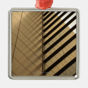 Modern architecture, yellow toned metal tree decoration
